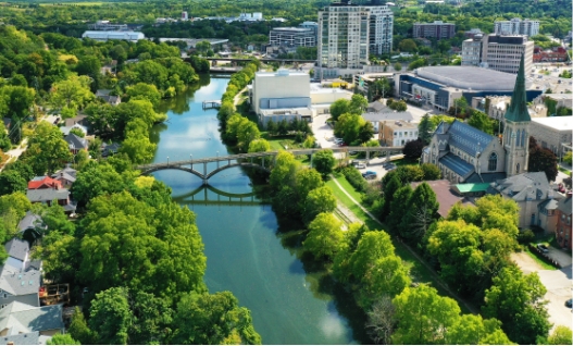 Municipal wastewater infrastructure along river supporting capacity and overflow management