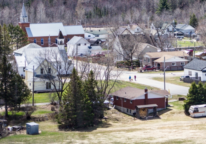Remote northern Ontario community with dispersed housing and natural surroundings illustrating decentralized water and wastewater systems designed for limited access conditions.